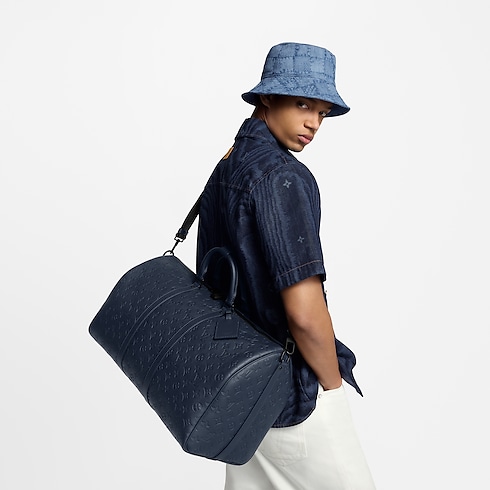 Keepall Bandoulière 50 Monogram Shadow in Bags and Small Leather Goods's Men Bags LV Icons collections by Louis Vuitton (Product zoom)