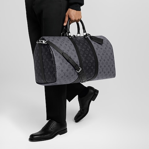 Keepall Bandoulière 50 Monogram Eclipse in Men's Travel Men's Duffle and Travel Bags collections by Louis Vuitton (Product zoom)