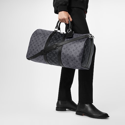 Keepall Bandoulière 50 Monogram Eclipse in Men's Travel Men's Duffle and Travel Bags collections by Louis Vuitton (Product zoom)