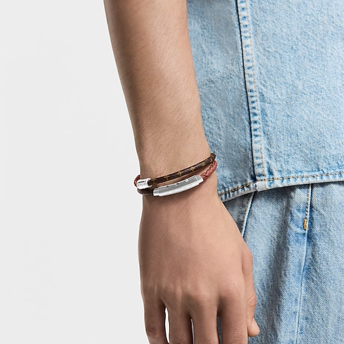 LV Double Spin Monogram Heritage Bracelet cropped worn view