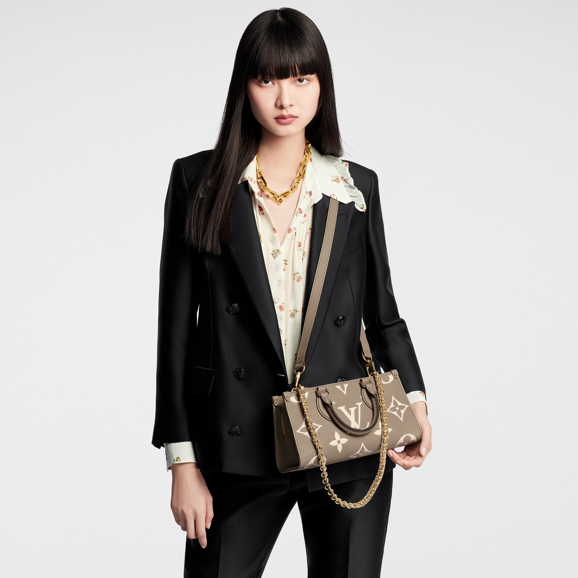 OnTheGo East West Bicolour Monogram Empreinte Leather in Women