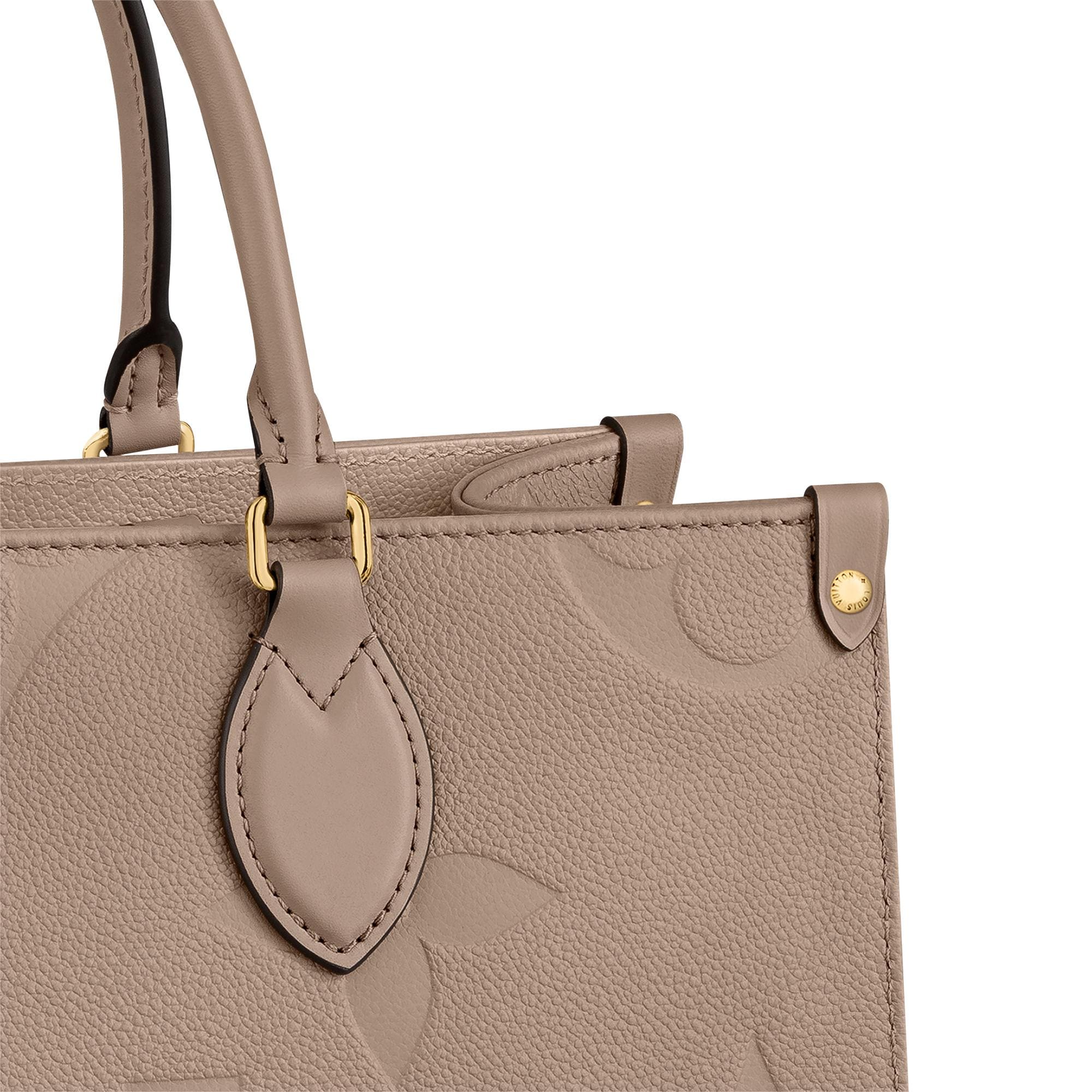 Onthego MM Monogram Empreinte Leather in Women