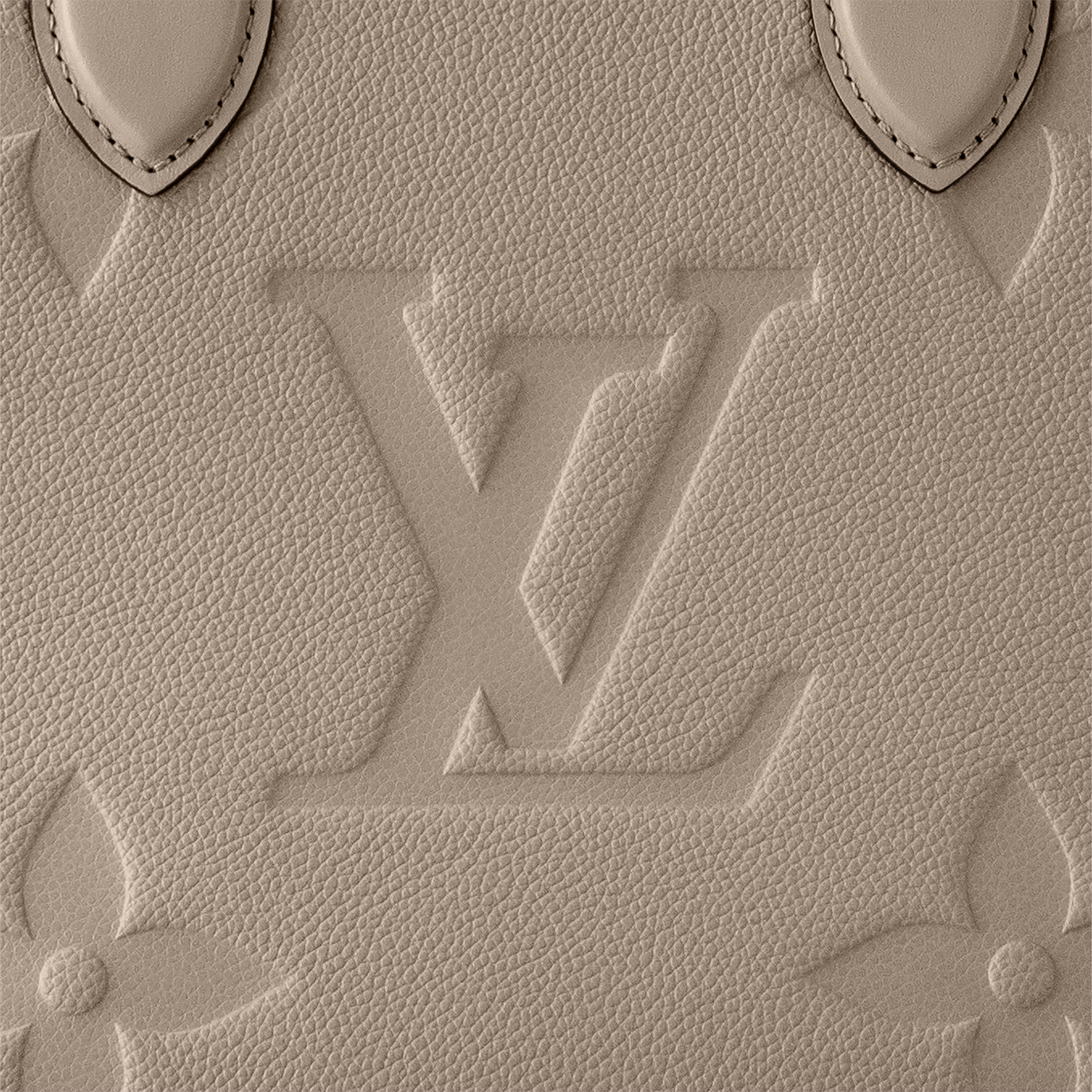 Onthego MM Monogram Empreinte Leather in Women