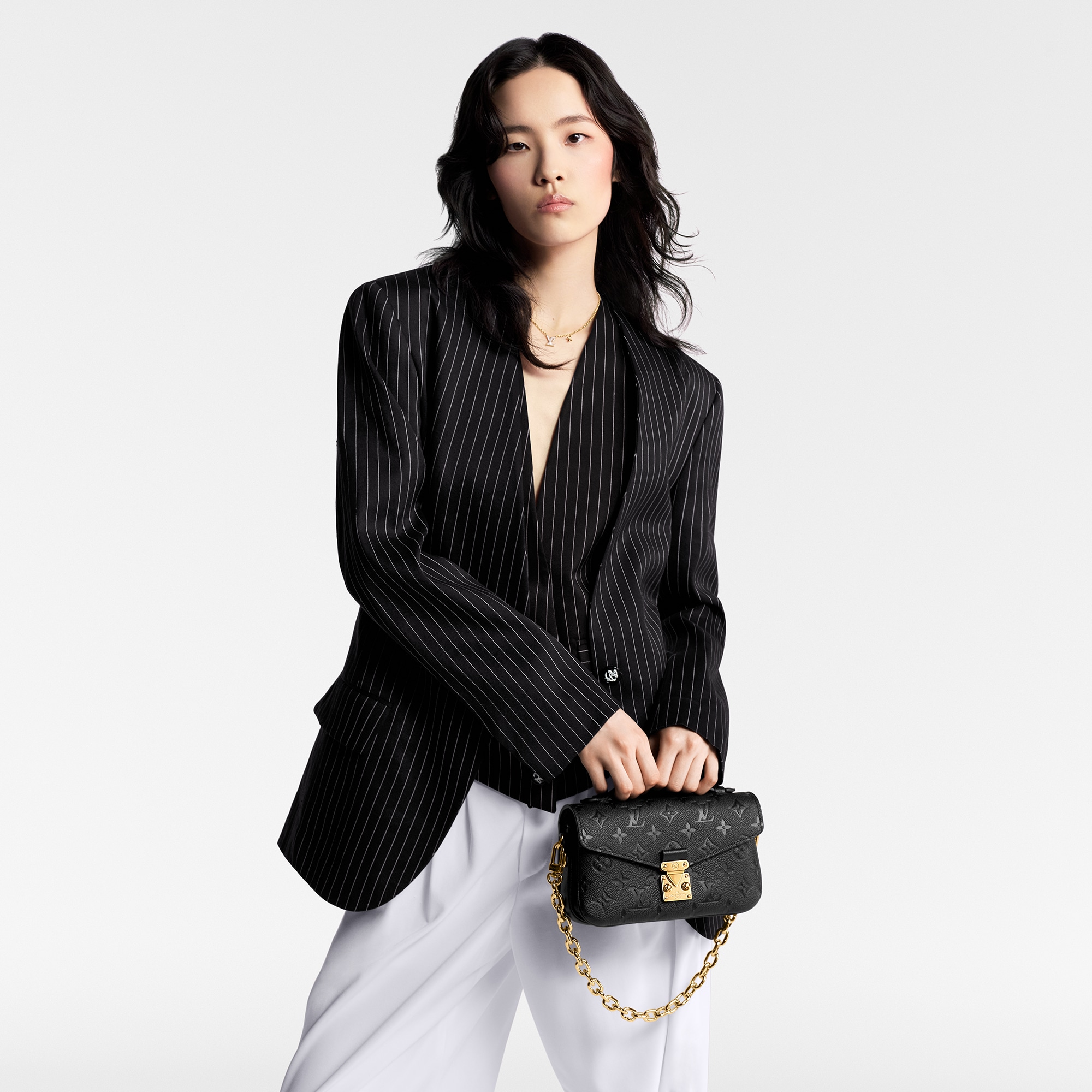 Pochette Métis East West Monogram Empreinte Leather Handbags