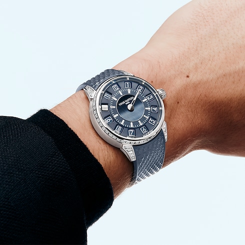 Tambour Taiko Spin Time, Automatic, 39.5mm, White gold, Hawk's eye and diamonds in Watches's All Watches } collections by Louis Vuitton (Product zoom)