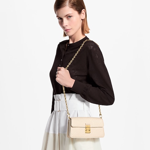 Wallet On Chain Métis Monogram Empreinte Leather in Women's Wallets and Small Leather Goods Nano Bags and Chain Wallets collections by Louis Vuitton (Product zoom)
